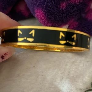 2 Kate Spade bangle bracelets.